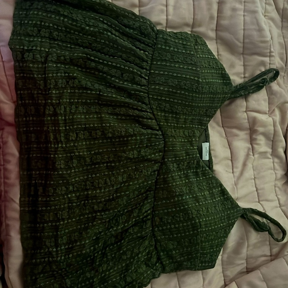 This is a olive green really cute top. I didn’t like the way it fit my body. XL.